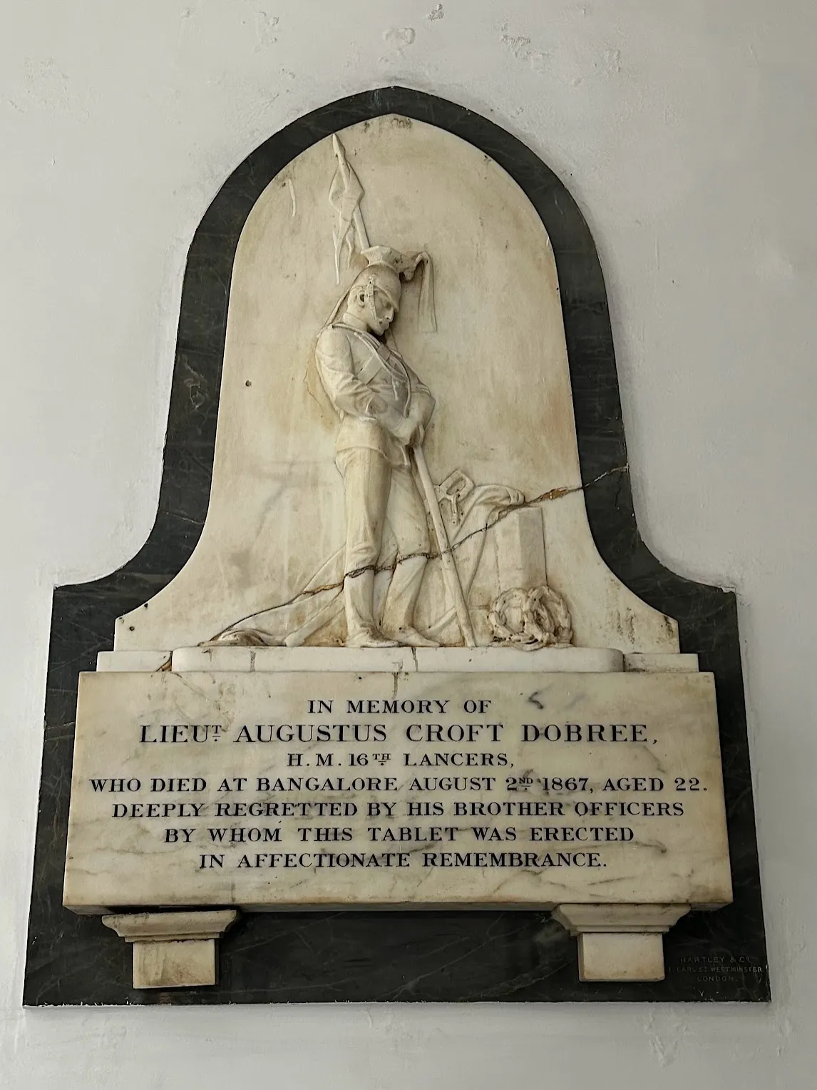 Marble memorial tablet on the church wall